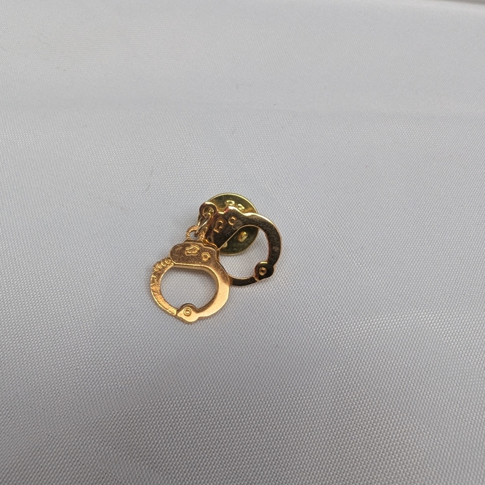 Gold Cuffs Brooch